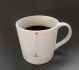 誰もが経験のあるコーヒーの滴をこぼしてしまう現象を解消したマグカップ